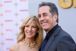 Jerry Seinfeld, right, the writer/director/star of "Unfrosted," poses with his wife Jessica at the premiere of the Netflix film at the Egyptian Theatre, Tuesday, April 30, 2024, in Los Angeles. (AP Photo/Chris Pizzello)
