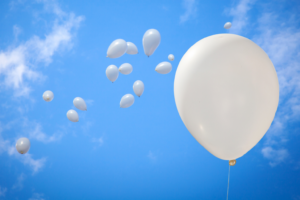White balloons in a blue sky. By MarcoScisetti/stock.adobe.com North Korea South Korea