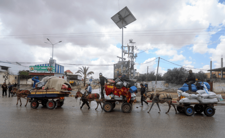 Palestinians flee from the eastern side of the southern Gaza city of Rafah after the Israeli army orders them to evacuate ahead of a military operation, in Rafah, Gaza Strip, Monday, May 6, 2024. The order affects tens of thousands of people and could signal a broader invasion of Rafah, which Israel has identified as Hamas' last major stronghold after seven months of war. (AP Photo/Ismael Abu Dayyah)