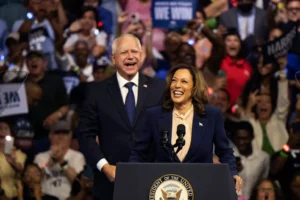 Democratic presidential nominee Vice President Kamala Harris and her running mate Minnesota Gov. Tim Walz speak at a campaign rally in Philadelphia, Tuesday, Aug. 6, 2024. (AP Photo/Joe Lamberti)