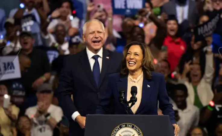 Democratic presidential nominee Vice President Kamala Harris and her running mate Minnesota Gov. Tim Walz speak at a campaign rally in Philadelphia, Tuesday, Aug. 6, 2024. (AP Photo/Joe Lamberti)