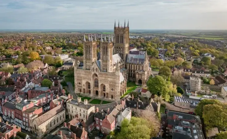 Aerial view of Lincoln City and an Anglican cathedral in England. By Stock87/stock.adobe.com.