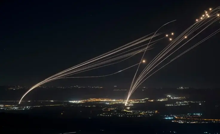 The Israeli Iron Dome air defense system fires to intercept an attack from Lebanon over the Galilee region as seen from the Israeli-annexed Golan Heights, Sunday, Aug. 4, 2024. (AP Photo/Leo Correa, File) Hezbollah missiles attacked Israel this weekend.