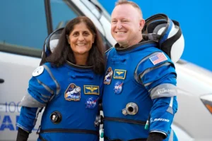 NASA astronauts Suni Williams, left, and Butch Wilmore stand together for a photo enroute to the launch pad at Space Launch Complex 41 Wednesday, June 5, 2024, in Cape Canaveral, Fla., for their liftoff on the Boeing Starliner capsule to the international space station. (AP Photo/Chris O'Meara, File)
