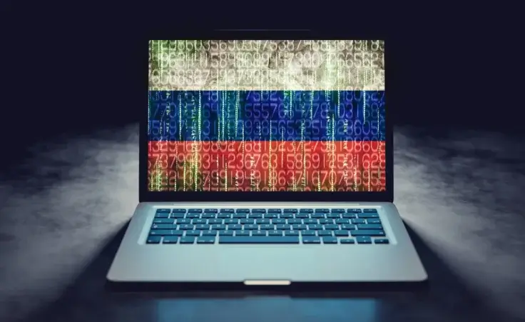 Computer displaying an interpretation of Russian cyber warfare. By PhotocreoBednarek/stock.adobe.com. Tenet Media russia.