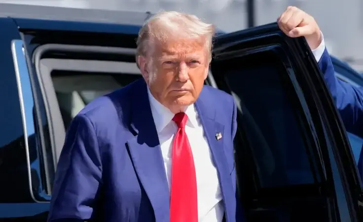 Republican presidential nominee former President Donald Trump arrives at Harry Reid International Airport to board a plane after a campaign trip, Saturday, Sept.14, 2024, in Las Vegas. (AP Photo/Alex Brandon) Trump assassination attempt