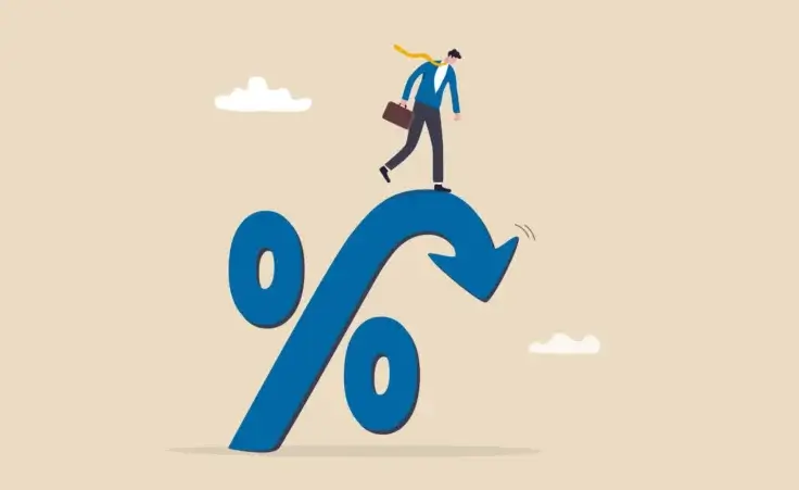 Illustration of man standing on top of a falling interest rate percentage sign. By Nuthawut/stock.adobe.com. Federal Reserve expected to announce interest rate cuts today
