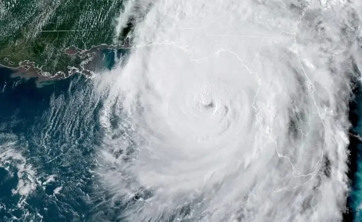 This GOES-16 GeoColor satellite image taken at 5:46 p.m. EDT and provided by National Oceanic and Atmospheric Administration (NOAA) shows Hurricane Helene in the Gulf of Mexico moving towards Florida, Thursday, Sept. 26 2024. (NOAA via AP)