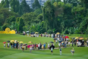 Yuka Saso of Japan, second right in front, walks on the 2nd fairway during the first round of Maybank LPGA Championship golf tournament at Kuala Lumpur Golf and Country club in Kuala Lumpur, Thursday, Oct. 24, 2024. (AP Photo/Vincent Thian)