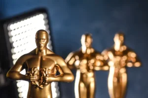 Oscar cinema movie statuette récompense. By Jean-Luc/stock.adobe.com