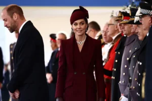 Britain's Catherine, Princess of Wales greets dignitaries as she arrives ahead of a Ceremonial Welcome for the Emir of Qatar at Horse Guards Parade in London, Tuesday Dec. 3, 2024. (Henry Nicholls via AP, Pool)