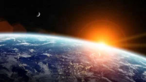 Sunrise over planet Earth in space By sdecoret/stock.adobe.com