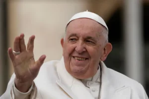 Pope Francis waves to faithful during his weekly general audience in St. Peter's Square, at the Vatican, Wednesday, March 29, 2023. Pope Francis went to a Rome hospital on Wednesday for some previously scheduled tests, slipping out of the Vatican after his general audience and before the busy start of Holy Week this Sunday. (AP Photo/Alessandra Tarantino)