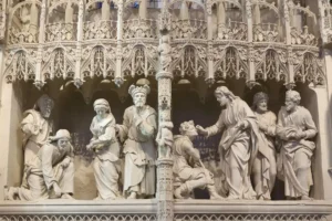 Notre Dame catholic cathedral, Chartres, France. Ambulatory sculptures. Jesus and the woman caught in adultery, by Jean Dedieu, 1678-1679, and Jesus healing a blind man, by Pierre I Legros, 1681-1683. by Julian/stock.adobe.com
