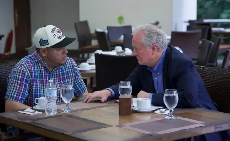 Maryland Sen. Chris Van Hollen, right, speaks with Kilmar Abrego Garcia, a Salvadoran citizen who was living in Maryland and deported to El Salvador by the Trump administration, in a hotel restaurant in San Salvador, El Salvador, Thursday, April 17, 2025. (Press Office Senator Van Hollen, via AP)