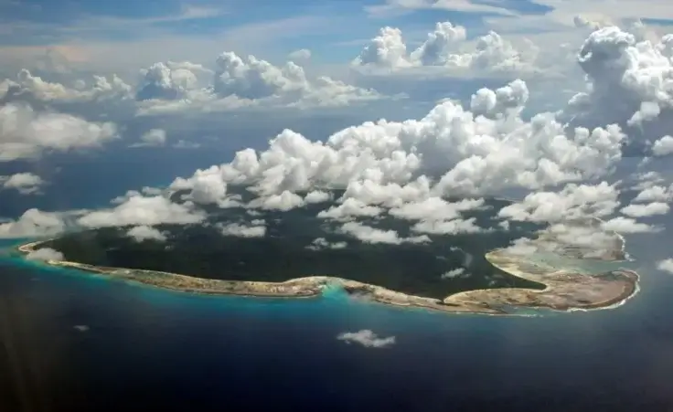 Clouds hang over the North Sentinel Island, in India's southeastern Andaman and Nicobar Islands, Nov. 14, 2005. (AP Photo/Gautam Singh, File)