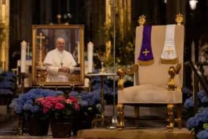 A picture of Pope Francis is displayed at St. Patrick's Cathedral, Monday, April 21, 2025, in New York. (AP Photo/Yuki Iwamura)