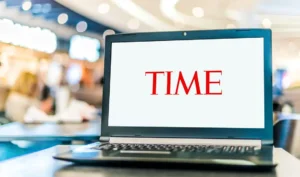 Laptop computer displaying logo of Time By monticellllo/stock.adobe.com