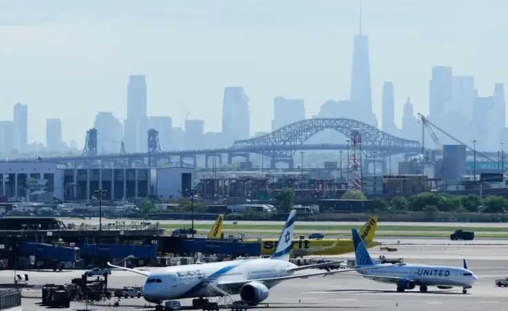 The New York City skyline is seen behind Newark Liberty International Airport in Newark, N.J., Wednesday, May 7, 2025. (AP Photo/Seth Wenig) Flying car announced.
