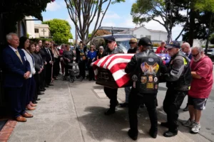 Members of the Patriot Guard Riders carry the casket, Friday, May 23, 2025, in San Leandro, Calif., containing the remains of U.S. Army Air Forces 2nd Lt. Thomas Kelly, who had been missing since being killed when the World War II bomber nicknamed Heaven Can Wait was hit by anti-aircraft fire and crashed into the water off the coast of Papua New Guinea on March 11, 1944. (AP Photo/Godofredo A. Vásquez) WWII bomber
