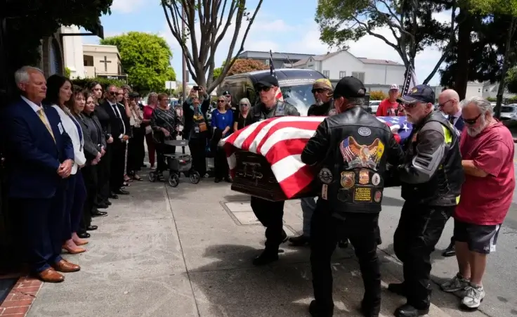 Members of the Patriot Guard Riders carry the casket, Friday, May 23, 2025, in San Leandro, Calif., containing the remains of U.S. Army Air Forces 2nd Lt. Thomas Kelly, who had been missing since being killed when the World War II bomber nicknamed Heaven Can Wait was hit by anti-aircraft fire and crashed into the water off the coast of Papua New Guinea on March 11, 1944. (AP Photo/Godofredo A. Vásquez) WWII bomber