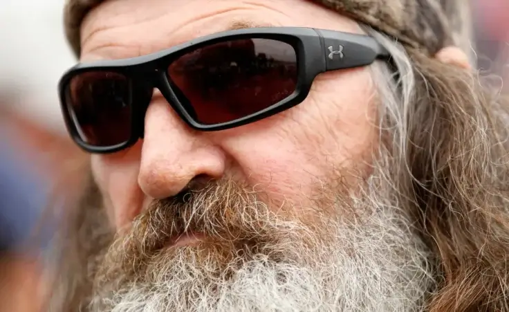 Duck Dynasty's Phil Robertson before the rain delayed NASCAR Sprint Cup Series auto race at Texas Motor Speedway in Fort Worth, Texas, Sunday, April 6, 2014. (AP Photo/Mike Stone)