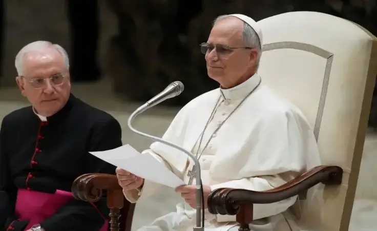 Pope Leo XIV meets with members of the international media in the Paul VI Hall at the Vatican, Monday, May 12, 2025. (AP Photo/Domenico Stinellis)