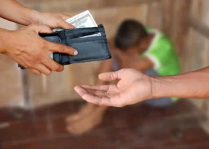 A child being sold to illustrate that child sex trafficking is among the most horrific forms of exploitation on Earth. By saiyood/stock.adobe.com