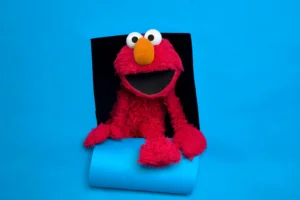 Elmo of the film "Being Elmo" poses for a portrait in the Fender Music Lodge during the 2011 Sundance Film Festival in Park City, Utahm Jan. 24, 2011. (AP Photo/Victoria Will, File) Pride Month Sesame Street