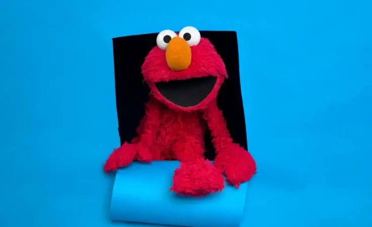 Elmo of the film "Being Elmo" poses for a portrait in the Fender Music Lodge during the 2011 Sundance Film Festival in Park City, Utahm Jan. 24, 2011. (AP Photo/Victoria Will, File) Pride Month Sesame Street