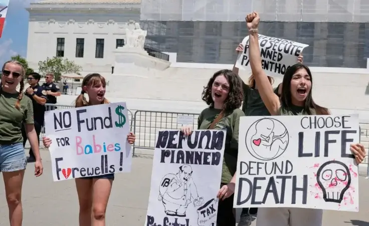 Anti-abortion protesters rally outside of the Supreme Court, Thursday, June 26, 2025, in Washington. (AP Photo/Mariam Zuhaib)