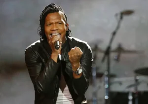 Michael Tait of Newsboys performs during the Dove Awards, Tuesday, Oct. 7, 2014, in Nashville, Tenn. (AP Photo/Mark Humphrey)