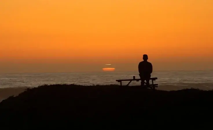 peaceful sunset/ At the end of the day, time spent in reflection brings peace. By tjdphoto/stock.adobe.com