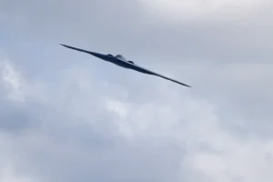 A B-2 Spirit stealth bomber, assigned to the 509th/131st Bomb Wings out of Whiteman Air Force Base, performs a flyover of Barnes-Jewish Hospital to honor healthcare professionals and essential employees fighting against the coronavirus Friday, May 8, 2020, in St. Louis. (AP Photo/Jeff Roberson)
