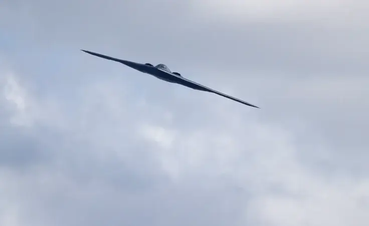 A B-2 Spirit stealth bomber, assigned to the 509th/131st Bomb Wings out of Whiteman Air Force Base, performs a flyover of Barnes-Jewish Hospital to honor healthcare professionals and essential employees fighting against the coronavirus Friday, May 8, 2020, in St. Louis. (AP Photo/Jeff Roberson)