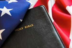 Bible, Religion, American Flag. By BillionPhotos.com/stock.adobe.com