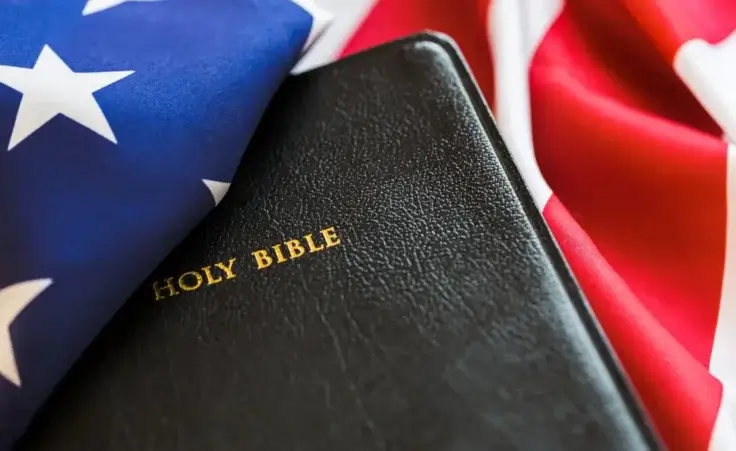 Bible, Religion, American Flag. By BillionPhotos.com/stock.adobe.com