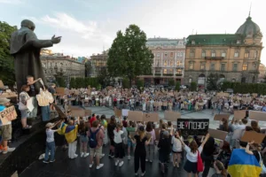 Demonstrators protest against a new bill proposed by President Volodymyr Zelenskyy restoring the independence of the country’s anti-corruption agencies, in Lviv, Ukraine, Thursday, July 24, 2025. (AP Photo/Mykola Tys)
