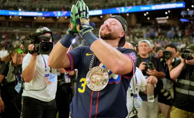 Seattle Mariners' Cal Raleigh celebrates after winning the MLB baseball All-Star Home Run Derby, Monday, July 14, 2025, in Atlanta. (AP Photo/Mike Stewart)