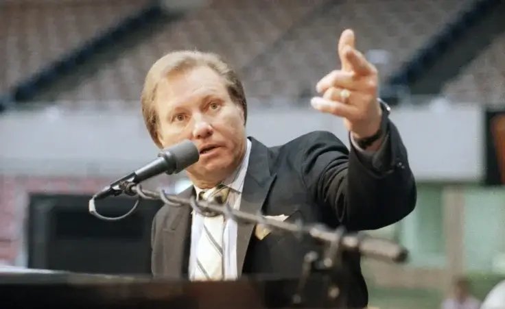 Rev. Jimmy Swaggart raises his fist to make point at news conference at the Sports Arena in Los Angeles, Friday, March 27, 1987. Swaggart denied accusations that he master-mined a plot to take over the rival PTL ministry, and said PTL leader Jim Bakker has yet to fully repent an extramarital sexual encounter. (AP Photo/Lennox McLendon)