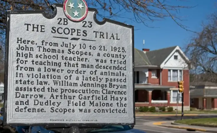 Scopes Monkey Trial historical sign in Dayton, Tennessee with brick house blurred on corner street. By LEe/stock.adobe.com Ozzy Ozborne