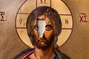 Vandalized art in an Orthodox church in Syria. By Goran/stock.adobe.com. Christianity