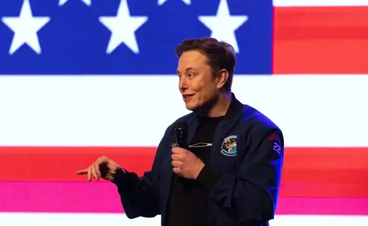 Elon Musk speaks during a town hall Sunday, March 30, 2025, in Green Bay, Wis. (AP Photo/Jeffrey Phelps)