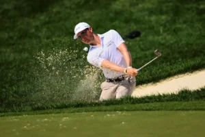 Ben Griffin plays a shot from a bunker on the 11th hole during the second round of the BMW Championship golf tournament, Friday, Aug. 15, 2025, in Owings Mills, Md. (AP Photo/Nick Wass)