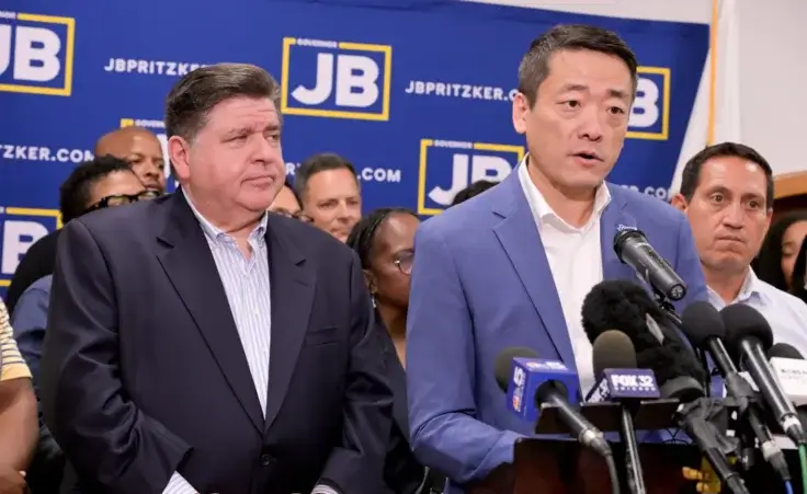 Texas House Democratic Caucus Chair Gene Wu along with other members of the Texas House are joined by Illinois Governor JB Pritzker as they speak about Texas Republican plans to redraw the House map office during a press conference at the Democratic Party of DuPage County office in Carol Stream, IL on Sunday, Aug. 3, 2025. (AP Photo/Mark Black)