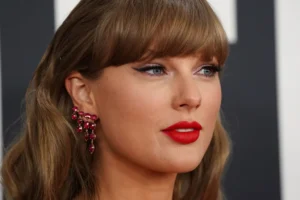 Taylor Swift arrives at the 67th annual Grammy Awards on Sunday, Feb. 2, 2025, in Los Angeles. (Photo by Jordan Strauss/Invision/AP) Taylor Swift Travis Kelsey engagement