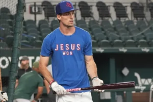 Texas Rangers' Evan Carter takes batting practice for the team's baseball game against the Oakland Athletics in Arlington, Texas, Friday, Sept. 8, 2023. (AP Photo/LM Otero)