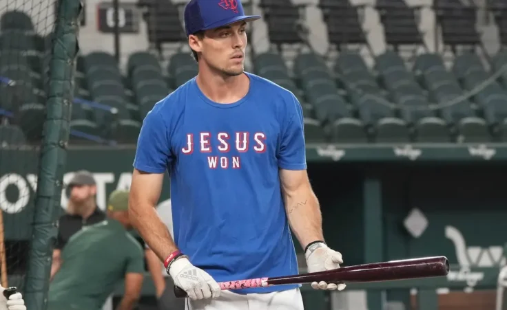 Texas Rangers' Evan Carter takes batting practice for the team's baseball game against the Oakland Athletics in Arlington, Texas, Friday, Sept. 8, 2023. (AP Photo/LM Otero)