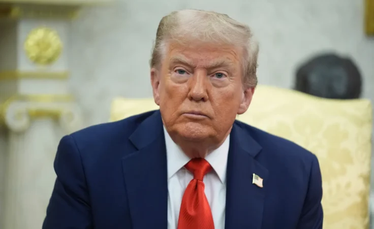 President Donald Trump listens during a meeting with Polish President Karol Nawrocki in the Oval Office of the White House, Wednesday, Sept. 3, 2025, in Washington. (AP Photo/Evan Vucci) Trump alive