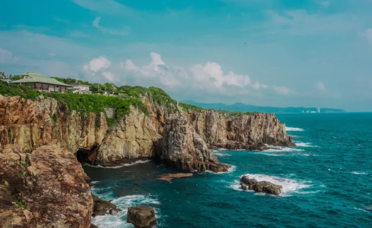 A striking coastal landscape of the Sandanbeki Cliffs in Shirahama, Japan. By Zhong/stock.adobe.com. suicide pastor Japan